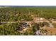 Aerial view of the property, showcasing its location in a wooded area at 13516 Sw 80Th St, Dunnellon, FL 34432