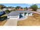 Aerial view of a single Gathering home with a two-car garage at 5971 Sw 99Th Pl, Ocala, FL 34476