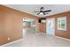 Bright dining room with tile floors and view into living area at 5971 Sw 99Th Pl, Ocala, FL 34476