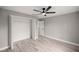 Bedroom with double door closet and ceiling fan at 6 Dogwood Circle Pl, Ocala, FL 34472