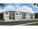 New townhome development showcasing three-story homes with attached garages at 6610 Sw 81St Loop, Ocala, FL 34476