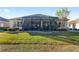 Spacious backyard with large screened patio at 6671 Sw 97Th Terrace Rd, Ocala, FL 34481