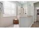 Walk-in shower with bench seating and grab bars at 6671 Sw 97Th Terrace Rd, Ocala, FL 34481