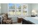 Bedroom with a view and comfortable seating at 6671 Sw 97Th Terrace Rd, Ocala, FL 34481