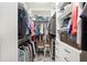 Spacious walk-in closet with custom shelving and drawers at 6671 Sw 97Th Terrace Rd, Ocala, FL 34481
