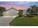 A charming single-story home with a two-car garage, mature landscaping, and attractive curb appeal at 6671 Sw 97Th Terrace Rd, Ocala, FL 34481