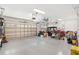 Garage with overhead storage, and plenty of space for vehicles and storage at 6671 Sw 97Th Terrace Rd, Ocala, FL 34481