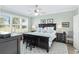 Spacious main bedroom with plantation shutters and golf course view at 6671 Sw 97Th Terrace Rd, Ocala, FL 34481