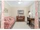 Home office features hardwood floors, piano, and window seating at 6671 Sw 97Th Terrace Rd, Ocala, FL 34481