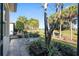 Enjoy the view from this patio with seating and lush landscaping at 6671 Sw 97Th Terrace Rd, Ocala, FL 34481