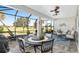 Enjoy this relaxing screened patio with outdoor furniture and golf course view at 6671 Sw 97Th Terrace Rd, Ocala, FL 34481