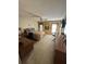 Bright bedroom with a queen-size bed and an ensuite desk at 8120 Nw 47Th Ln, Ocala, FL 34482