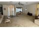 Open living room with ample space and view to dining area at 8120 Nw 47Th Ln, Ocala, FL 34482