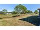 Landscaped backyard with golf course and trees at 9350 Sw 91St Court Rd, Ocala, FL 34481