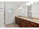 Double vanity bathroom with large mirror and walk-in shower at 9350 Sw 91St Court Rd, Ocala, FL 34481