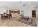 Spacious dining area with a large table and chairs, adjacent to the kitchen at 9350 Sw 91St Court Rd, Ocala, FL 34481