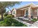 Landscaped front yard with walkway to the front door at 9350 Sw 91St Court Rd, Ocala, FL 34481