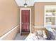 Red front door entryway to the home at 9350 Sw 91St Court Rd, Ocala, FL 34481