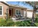 Inviting front porch with seating and landscaping at 9350 Sw 91St Court Rd, Ocala, FL 34481