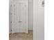 White double door closet with neutral tile flooring at 9350 Sw 91St Court Rd, Ocala, FL 34481