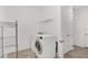 Laundry room with washer, dryer, and cabinets at 9350 Sw 91St Court Rd, Ocala, FL 34481