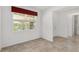 Office with window, tile floors, and access to hallway at 9350 Sw 91St Court Rd, Ocala, FL 34481