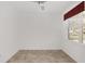 Spacious office with tile floors and ceiling fan at 9350 Sw 91St Court Rd, Ocala, FL 34481
