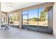 Spacious screened porch with view of backyard and golf course at 9350 Sw 91St Court Rd, Ocala, FL 34481