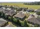 Aerial view of a residential neighborhood with houses and green spaces at 9826 Sw 63Rd Loop, Ocala, FL 34481