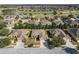 Aerial view of house and neighborhood, showcasing the community and golf course at 9826 Sw 63Rd Loop, Ocala, FL 34481