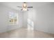 Bright bedroom with tile flooring and window shutters at 9826 Sw 63Rd Loop, Ocala, FL 34481