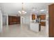Open dining room with kitchen and living room views at 9826 Sw 63Rd Loop, Ocala, FL 34481