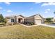 Single story house with a two-car garage and manicured lawn at 9826 Sw 63Rd Loop, Ocala, FL 34481