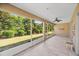 Spacious screened porch overlooking the backyard at 9826 Sw 63Rd Loop, Ocala, FL 34481