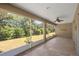 Relaxing screened porch with view of backyard at 9826 Sw 63Rd Loop, Ocala, FL 34481