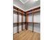 Large walk-in closet with ample shelving and hanging space at 9826 Sw 63Rd Loop, Ocala, FL 34481
