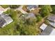 Aerial view of house, backyard, and surrounding trees at 10816 Sw 83Rd Ave, Ocala, FL 34481