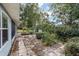 Stone patio and partially landscaped backyard at 10816 Sw 83Rd Ave, Ocala, FL 34481