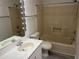 Clean bathroom with a tub and updated vanity at 10842 Se 50Th Ave # 1, Belleview, FL 34420