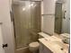 Clean bathroom with shower stall, toilet and vanity with sink at 10842 Se 50Th Ave # 1, Belleview, FL 34420