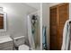 Bathroom with shower, toilet, and white vanity at 17411 Se 18Th St, Silver Springs, FL 34488