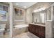 Relaxing bathroom with soaking tub and granite vanity at 17819 Sw 61St Lane Rd, Dunnellon, FL 34432
