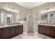 Elegant bathroom with double sinks and a large shower at 17819 Sw 61St Lane Rd, Dunnellon, FL 34432