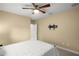 Bright bedroom with ceiling fan, ample space and neutral wall colors at 17819 Sw 61St Lane Rd, Dunnellon, FL 34432