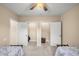 Bedroom with two beds, walk-in closets and additional storage at 17819 Sw 61St Lane Rd, Dunnellon, FL 34432