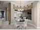 Charming breakfast nook with a round table and view of the backyard at 17819 Sw 61St Lane Rd, Dunnellon, FL 34432