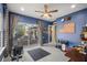 Home gym with equipment and sliding doors to pool area at 17819 Sw 61St Lane Rd, Dunnellon, FL 34432
