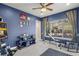 Home gym with exercise equipment and access to backyard at 17819 Sw 61St Lane Rd, Dunnellon, FL 34432
