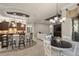 Open concept kitchen boasts an island, stainless steel appliances, and ample counter space at 17819 Sw 61St Lane Rd, Dunnellon, FL 34432
