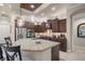 Modern kitchen with granite countertops and dark wood cabinetry at 17819 Sw 61St Lane Rd, Dunnellon, FL 34432